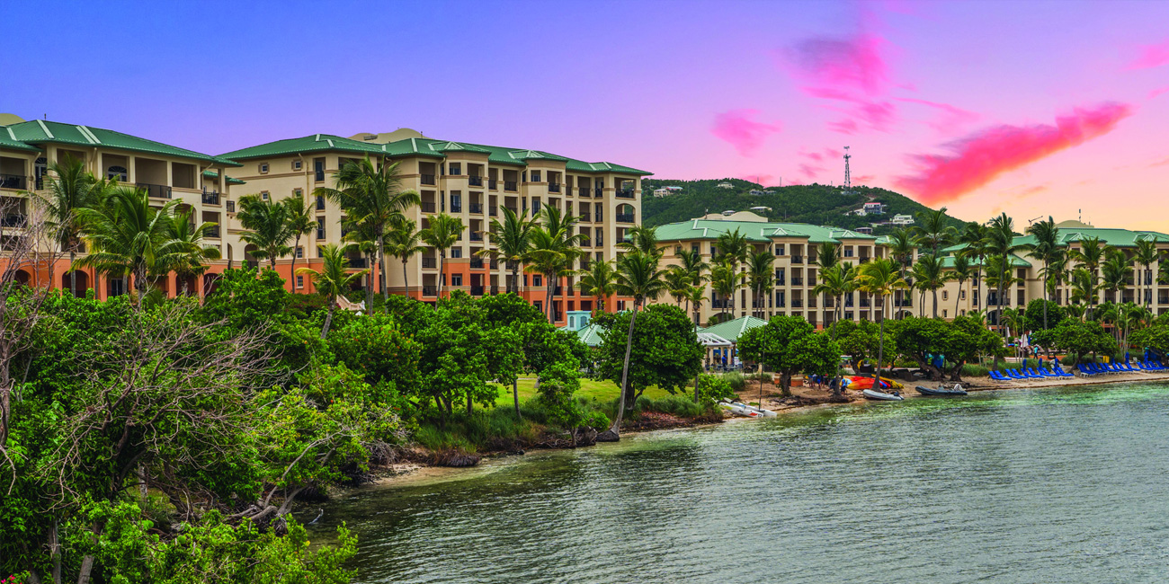 Calm waters sit at the edge of the resort